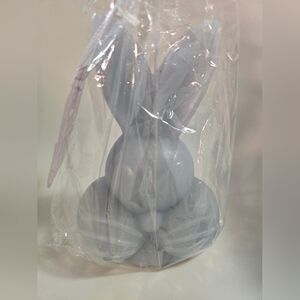 Solid Wax Light Blue Bunny Face Candle Figure. 6"H x 4"W x 3" D.